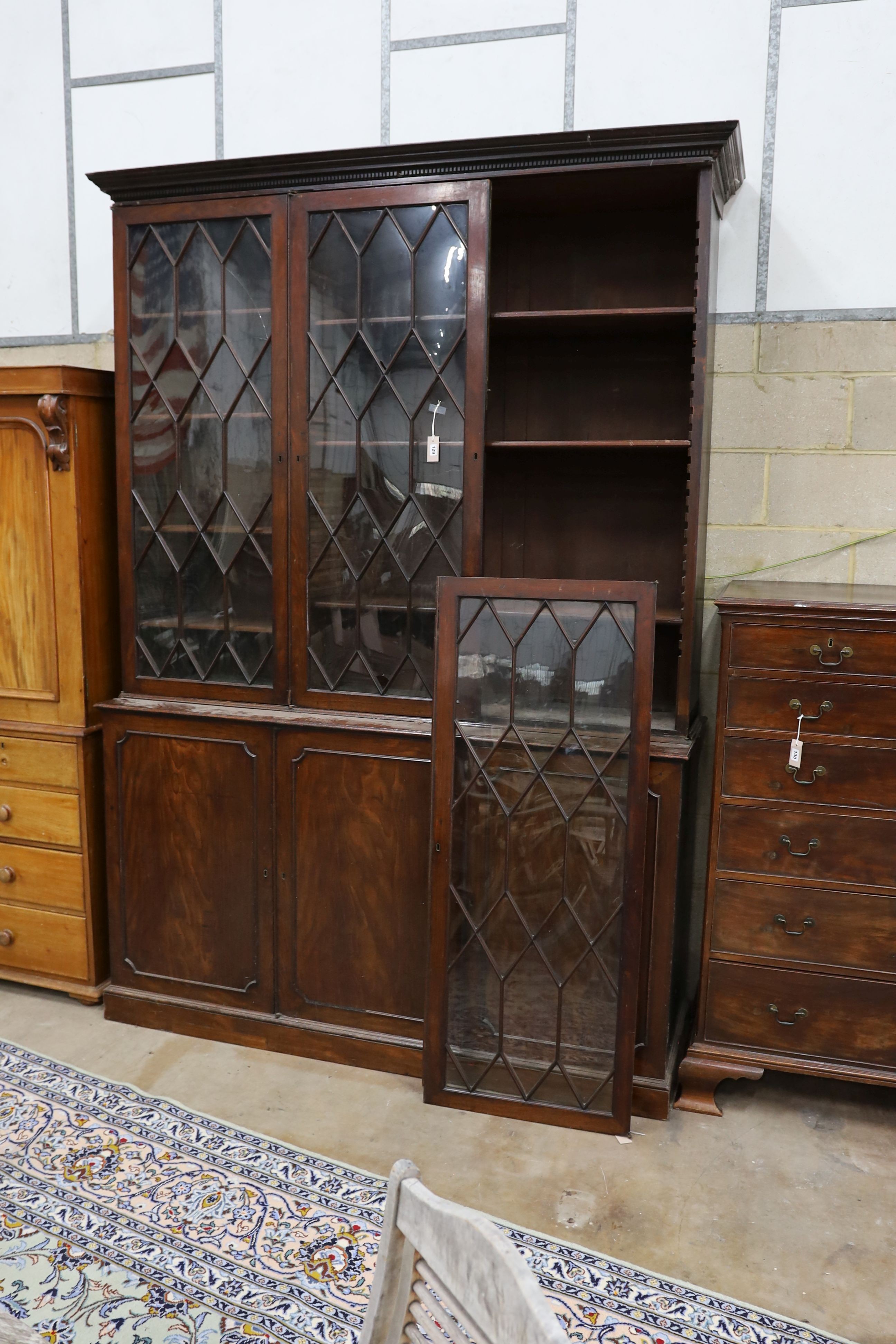 A George III mahogany library bookcase, length 182cm, depth 58cm, height 268cm